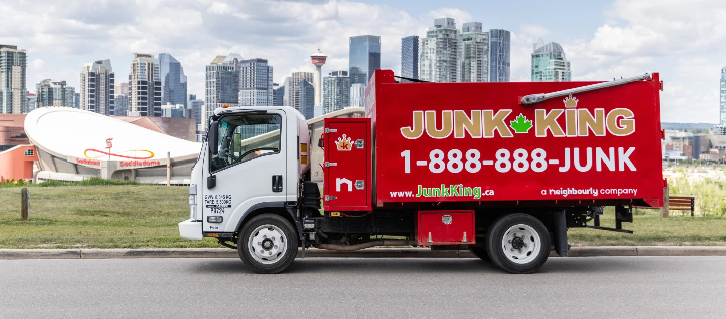 A Junk King truck in front of job site.